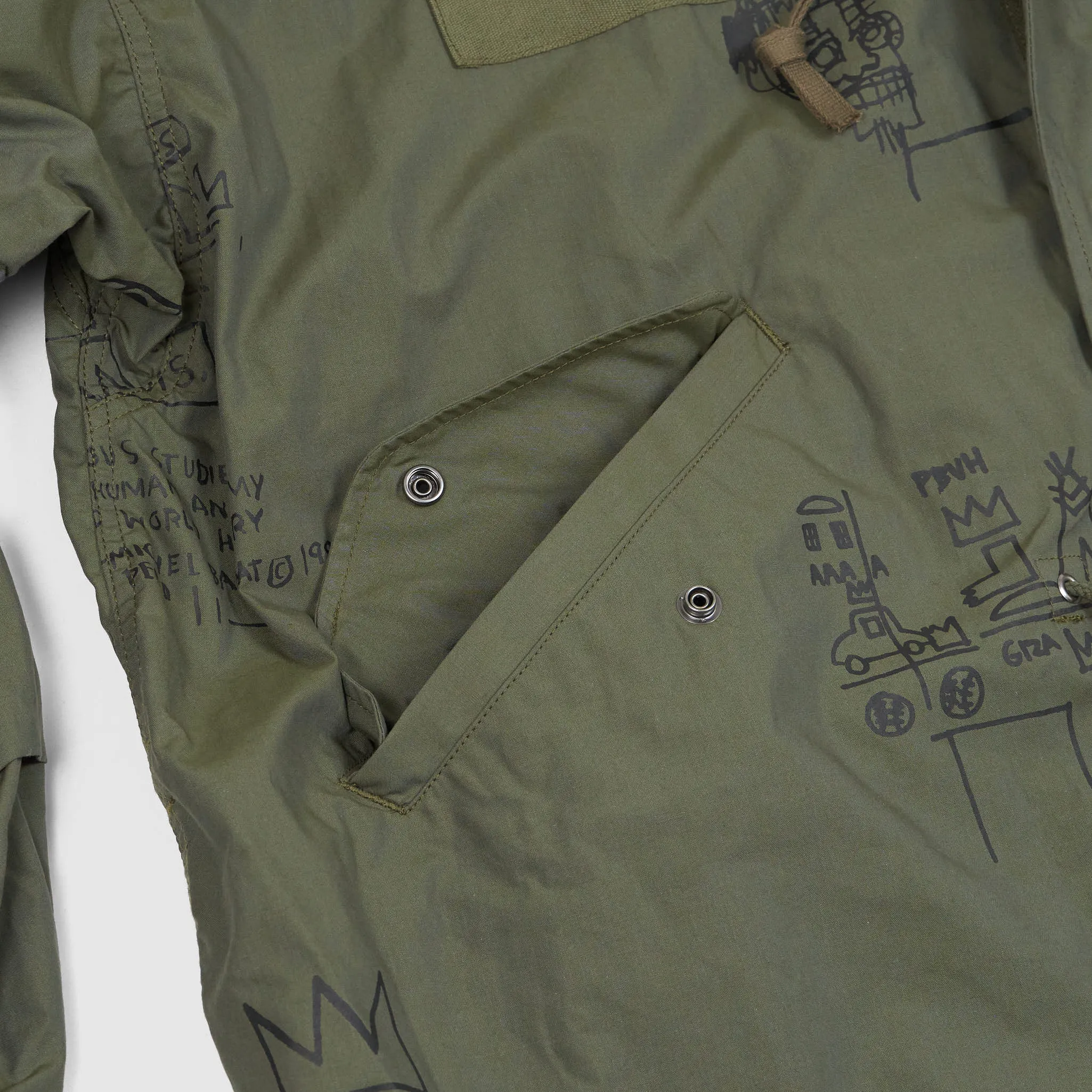 Junya Watanabe MAN x Jean-Michel Basquiat Fishtail Parka UNISEX