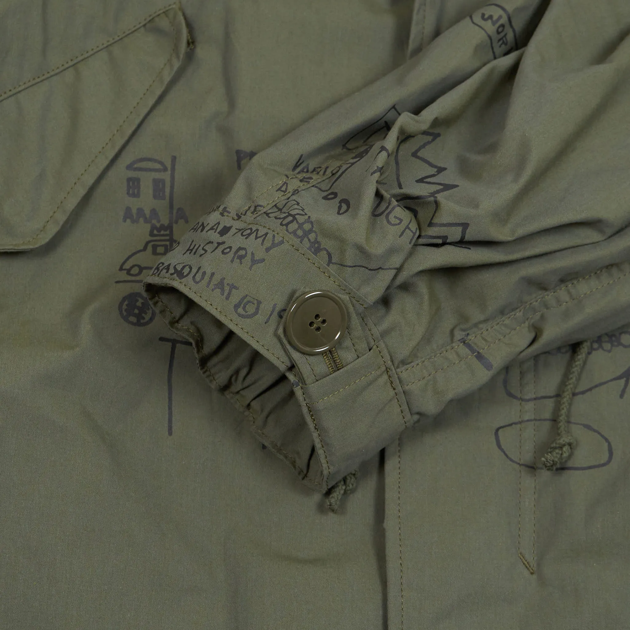 Junya Watanabe MAN x Jean-Michel Basquiat Fishtail Parka UNISEX